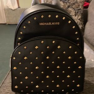 Michael kors medium black backpack never used